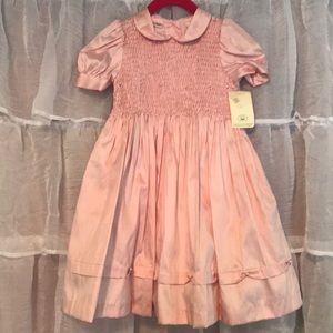 100% silk, pink with pearl accents